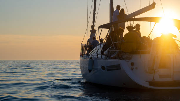 istock Friends looking at view from boat 1444105530