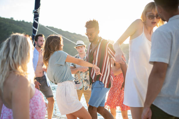 istock Friends dancing on sail boat 1444105536