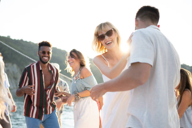 istock Friends dancing on sail boat 1444105542