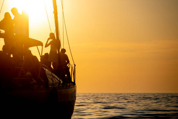istock Friends standing on boat 1444105545