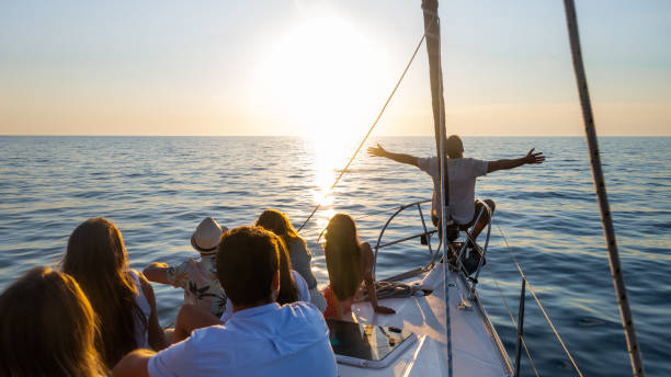 istock Friends sitting on boat deck 1444105546