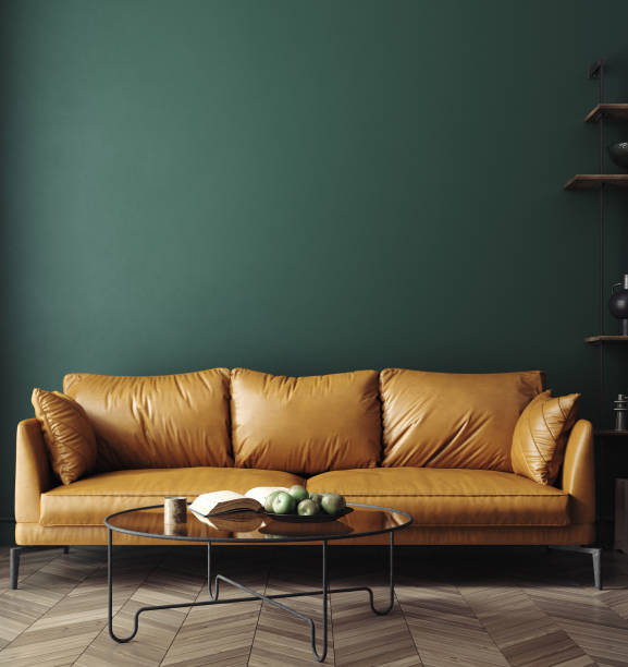 istock Home interior mock-up with brown leather sofa, table and decor in living room 1444108006