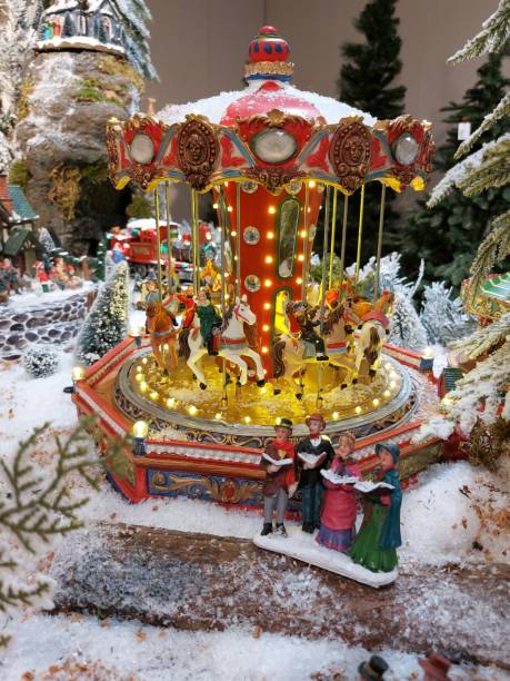 istock Christmas image of a toy carousel. 1444110059