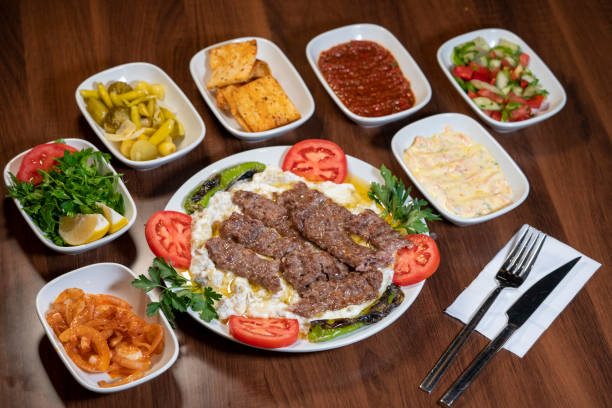 istock Traditional Turkish meal kebab on table top view 1444112095