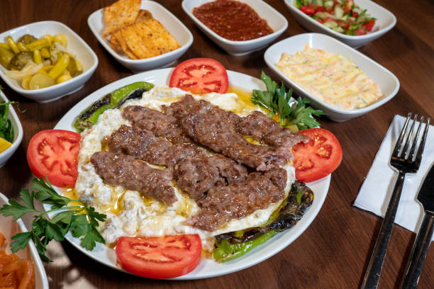 istock Traditional Turkish meal kebab on table top view 1444112172