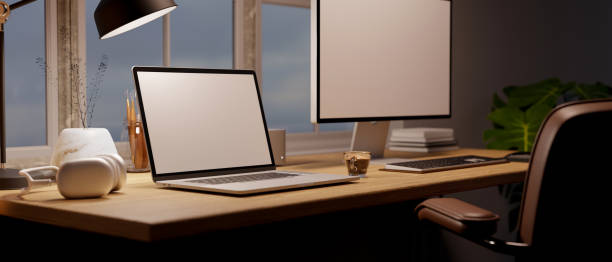 istock Cozy wood home working room with computer and notebook laptop mockup on wood table 1444114865