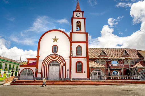 The little town with colourful streets called Murillo Tolima in Colombia, Main square and the church in a sunny day.