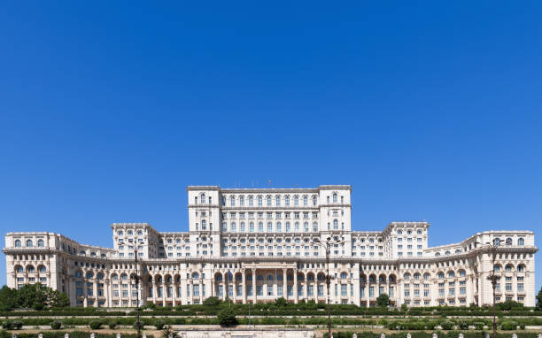 Widescreen view of the Palace of the Parliament (Romanian: Palatul Parlamentului) is the seat of the Parliament of Romania in Bucharest Widescreen view of the Palace of the Parliament (Romanian: Palatul Parlamentului) is the seat of the Parliament of Romania in Bucharest parliament palace in bucharest romania the largest building in europe stock pictures, royalty-free photos & images