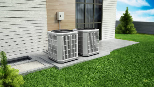 Heat pumps outside the modern house Heat pumps outside the modern house, installed near the wall. condenser stock pictures, royalty-free photos & images