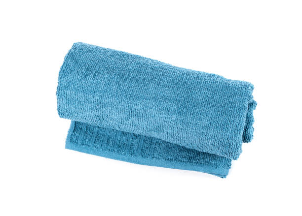 istock Rolled Blue Towel Isolated. New Terry Cotton Towel, Soft Washcloth 1444118621