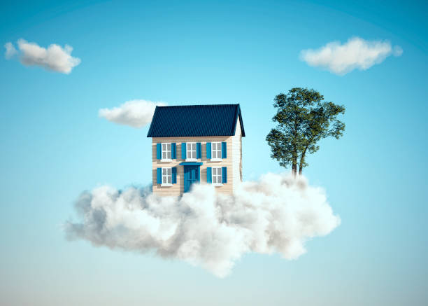 istock House and a tree on a cloud. Dream house and loan concept. 1444119680