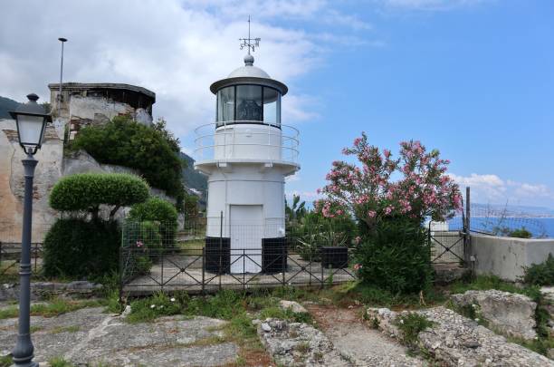 Scilla - Lighthouse on the terrace of Castello Ruffo Scilla, Calabria, Italy – June 13, 2021: Navy lighthouse on a terrace of Castello Ruffo castle scilla stock pictures, royalty-free photos & images