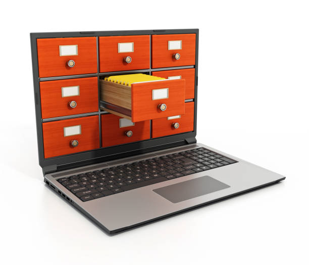 istock File cabinets or catalogue drawers inside the laptop screen. Folders standing inside the drawer 1444128836