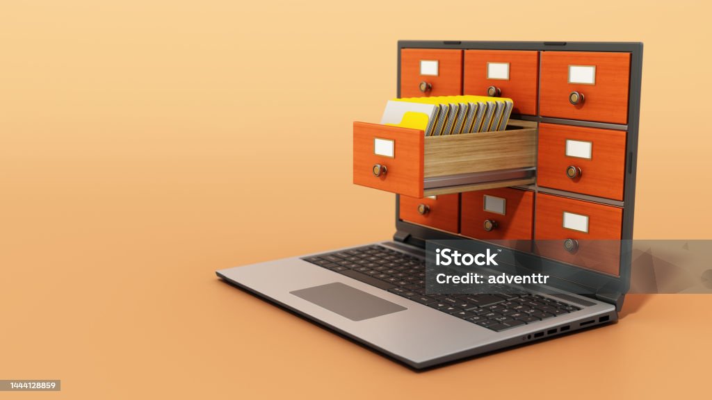 File cabinets or catalogue drawers inside the laptop screen. Folders standing inside the drawer File cabinets or catalogue drawers inside the laptop screen. Folders standing inside the drawer. Organization Stock Photo