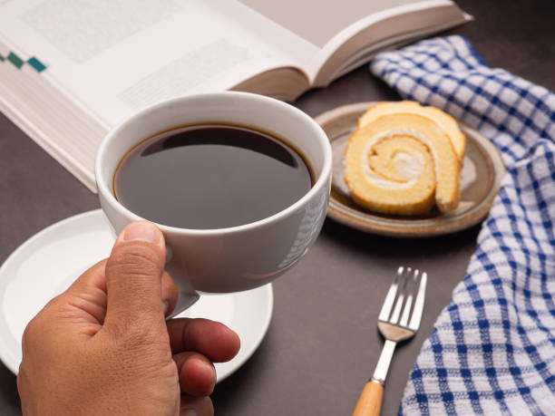 study scene, coffee and books lit with natural light
