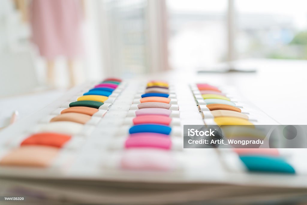 Closeup Of Colorful Sample Fabrics Catalog Palette Rack Color Sample