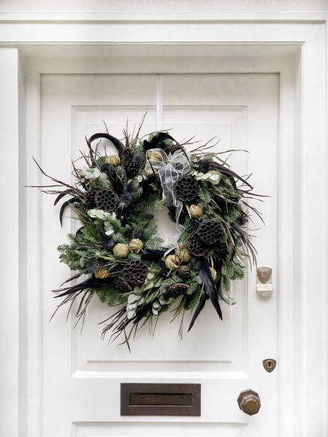 istock Christmas wreath on a wooden door 1444135687