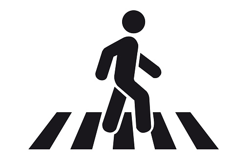 Crosswalk sign with a man icon on a white background