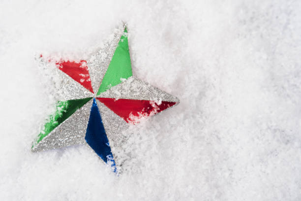 istock New Year's composition. Christmas decorative star in the snow 1444137475