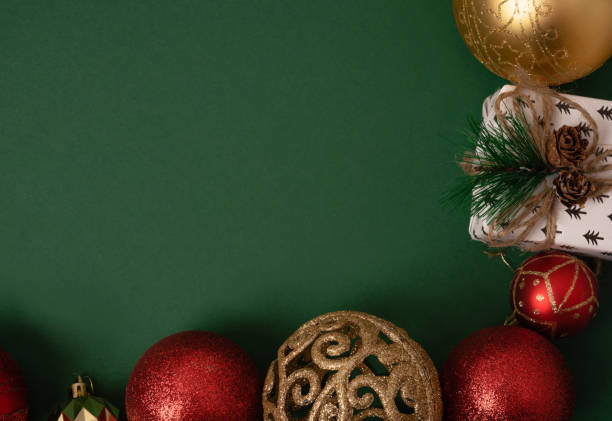 istock Christmas decorations on a green background. Flat lay 1444137492
