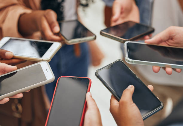 istock People group hands, phone screen and social media mobile apps, typing and digital iot connection together. Closeup social network, internet website and 5g smartphone cloud computing technology online 1444137955