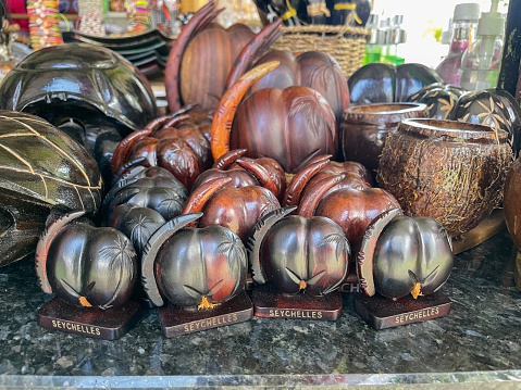 Coco de mer, sea coconut or double coconut (Lodoicea maldivica) is a rare, giant fruit of the Lodoicea palm tree that grows only in the Praslin and Curieuse in the Seychelles
