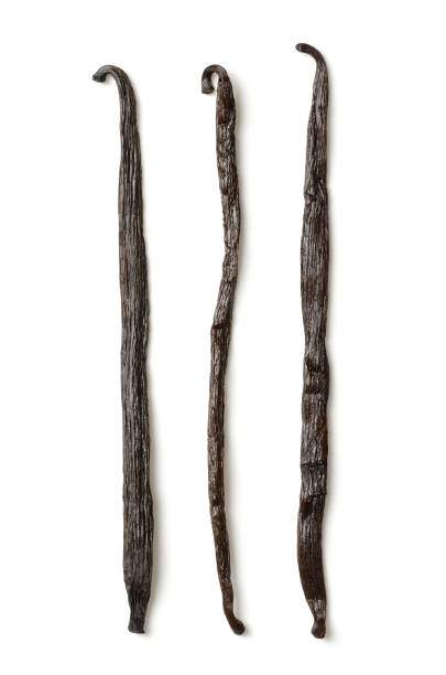 istock Dried Bourbon vanilla pods, three whole vanilla beans, from above 1444139966