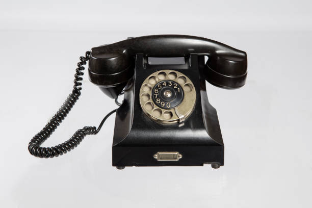 istock Old telephone isolated white background 1444144040