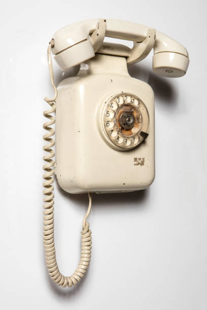 istock Old telephone isolated white background 1444144436