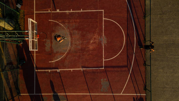 istock Friends playing basketball 1444144643