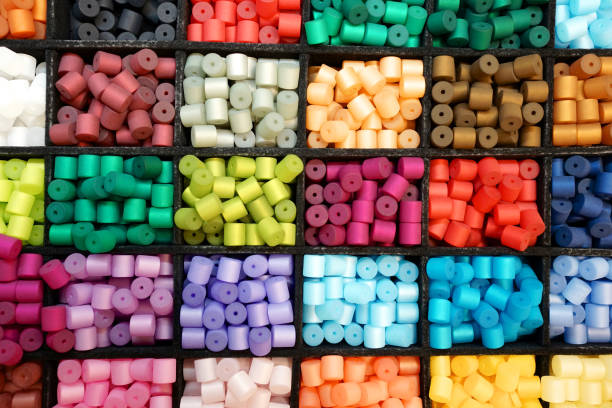 istock Colorful plastic beads for jewelry making in a box 1444146945