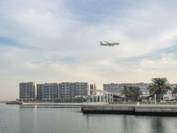 istock An airplane approaching an airport to land 1444148606