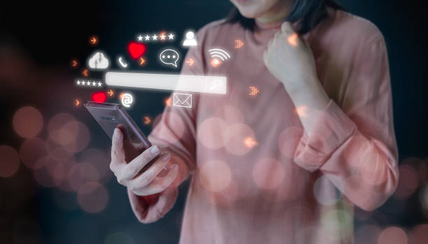 istock Business woman use mobile phone streaming virtual business network, text message, process diagram. Staying connected. Smartphone with icon social media and social network everyday technology usage. 1444148662