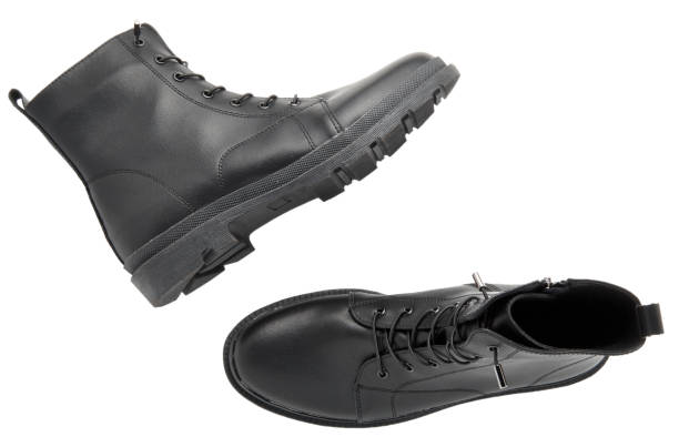 istock Pair of black shoes isolates on white background 1444148744