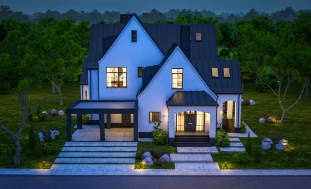 istock 3d rendering of white and black modern Tudor house in night 1444156857