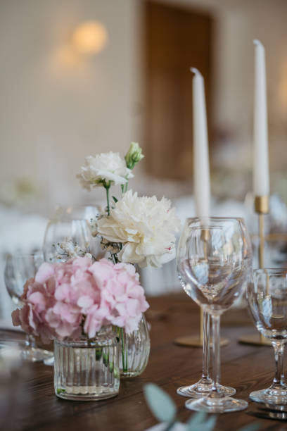 istock Table decoration with flower decoration on dark wooden table 1444162284