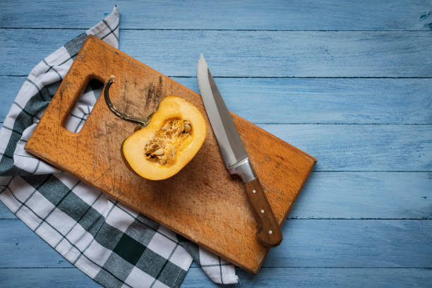 istock Pumpkins on wood 1444169446