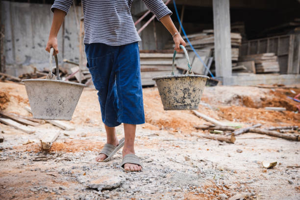 rights day on december 10. poor children are forced to work construction, violence children and trafficking concept,anti-child labor. - business slave imagens e fotografias de stock