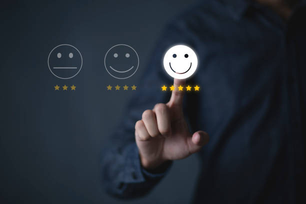 istock Consumers are evaluating their satisfaction with the service. Consumers write reviews about their satisfaction with a product or service. Consumers use the smiley face icon symbol and 5 stars. 1444171727