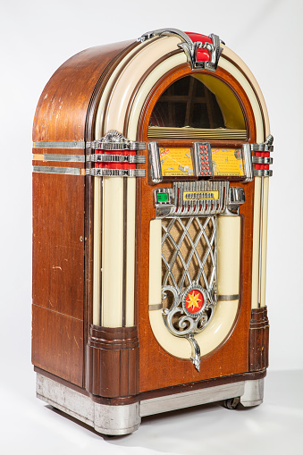 Old jukebox music player isolated on white background