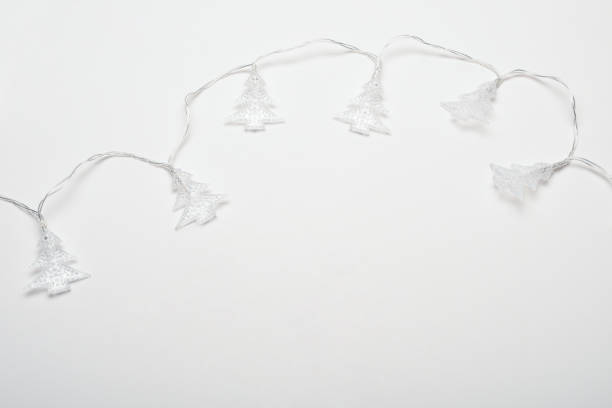 Christmas tree shape Christmas lights on the white background