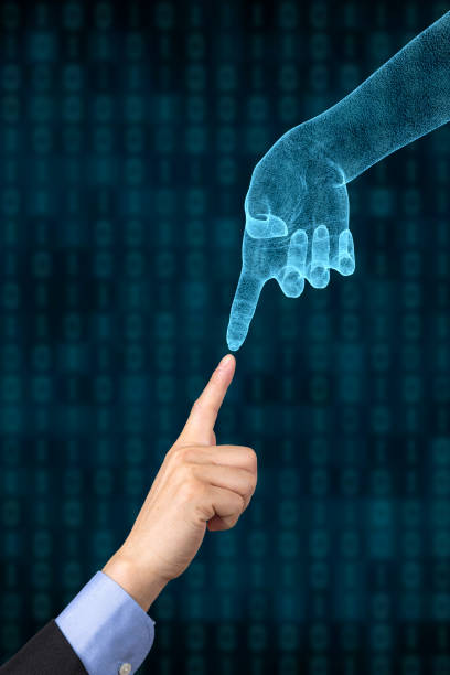 AI:Real human hand and virtual hand touching technology stock photo
