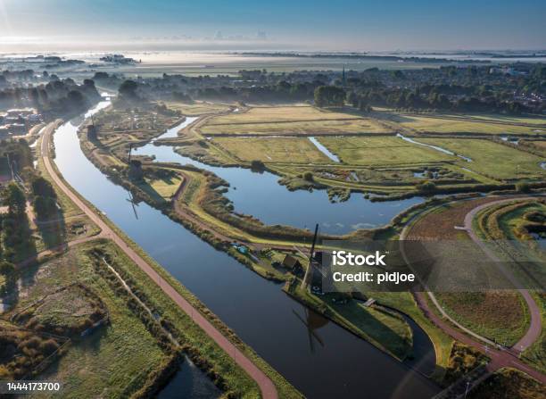 Three Windmills In Alkmaar Netherlands Stock Photo - Download Image Now - 4K Resolution, Agriculture, Alkmaar