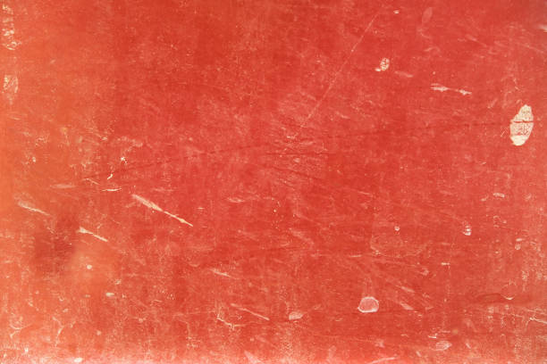 istock The texture of old painted iron. Red background with rust. Worn iron background. Metal with elements of corrosion. 1444176092