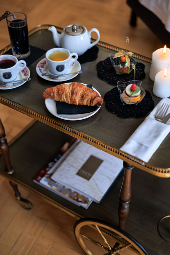 Hotel breakfast tea, coffee, finger food croissant