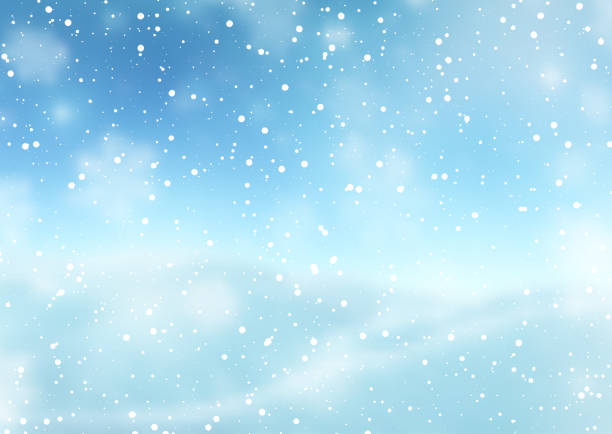 istock Christmas background with falling snow against a defocussed winter landscape 1444182751