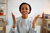 istock Portrait of smiling African-American businesswoman while having a video conference at her office 1444185197