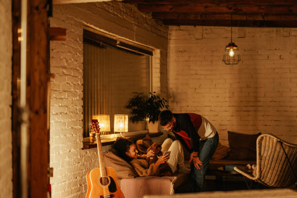 istock Couple enjoying leisure time at home. 1444189166