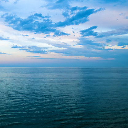 Sunrise over the sea background. Colorful ocean beach.