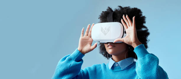 istock Girl, VR and mockup for gaming, web and technology with studio background space. Model, woman and glasses for virtual reality for esports, movies and games on face in advertising futuristic 3D games 1444190962